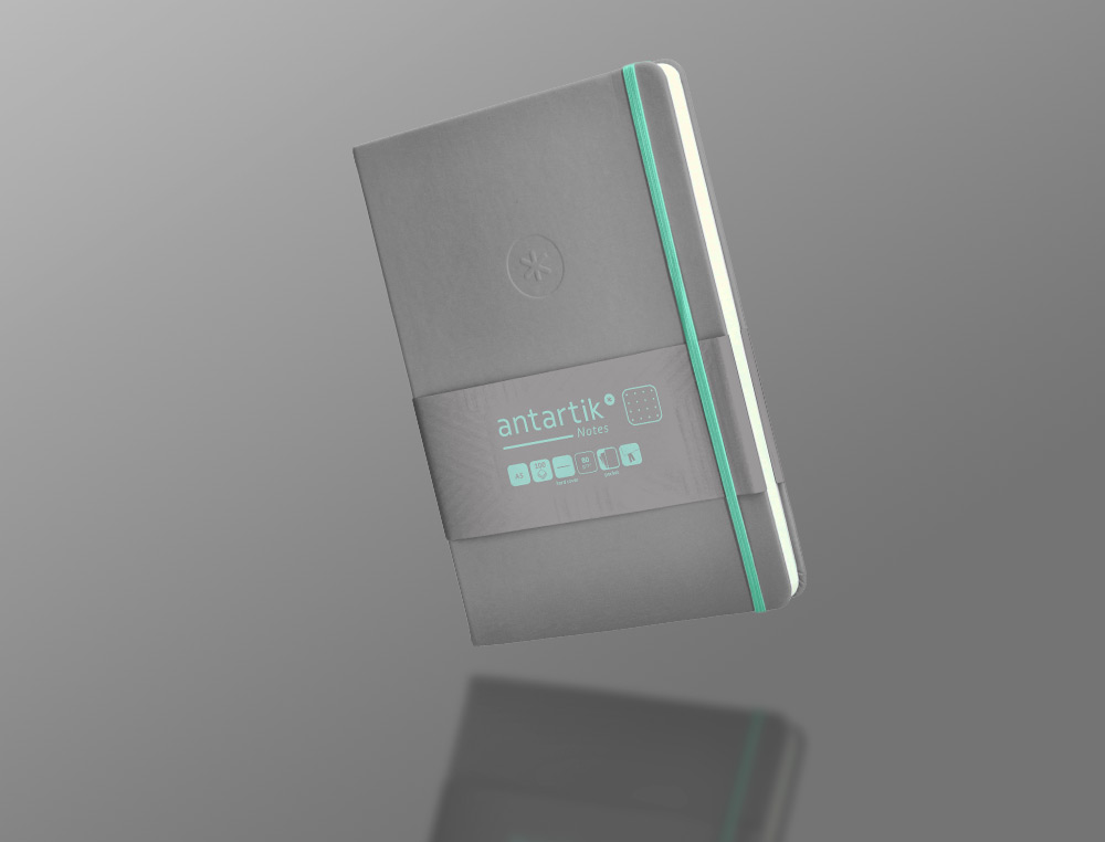 CADERNO COM ELASTICO ANTARTIK NOTES CAPA DURA A5 PONTILHADO CINZA E TURQUESA 100 FOLHAS 80 GR FSC